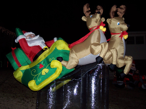 Elevated Santa sleigh and reindeer